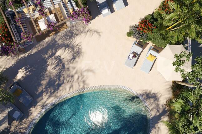 An Exceptional Duplex Penthouse with Sweeping Views Moments from the Beach