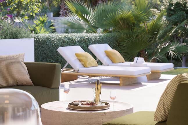 An Exceptional Duplex Penthouse with Sweeping Views Moments from the Beach