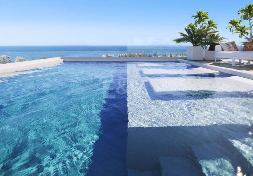 An Exceptional Duplex Penthouse with Sweeping Views Moments from the Beach