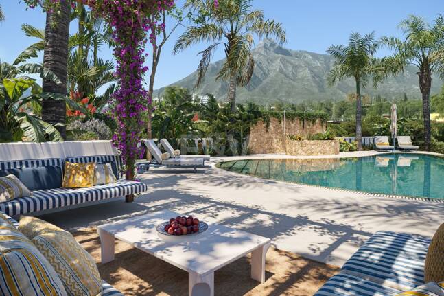 An Exceptional Duplex Penthouse with Sweeping Views Moments from the Beach