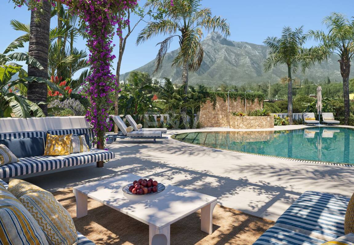 An Exceptional Duplex Penthouse with Sweeping Views Moments from the Beach