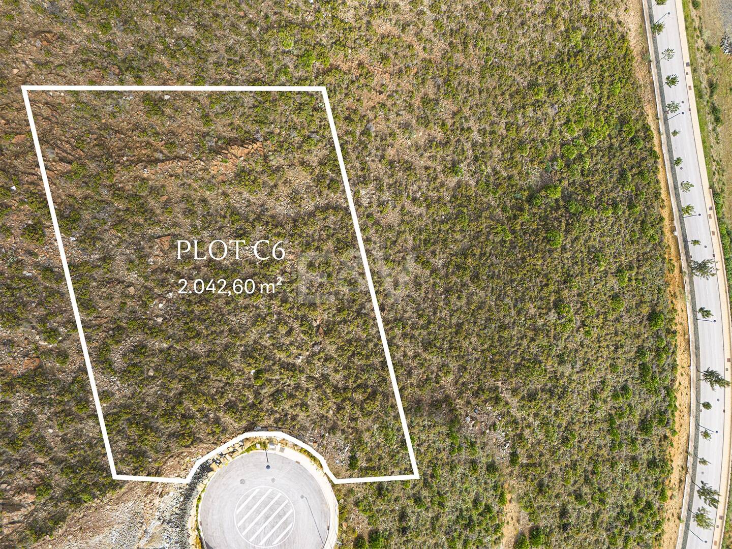 Exklusiv tomt i prestigefylld resort med hisnande utsikt