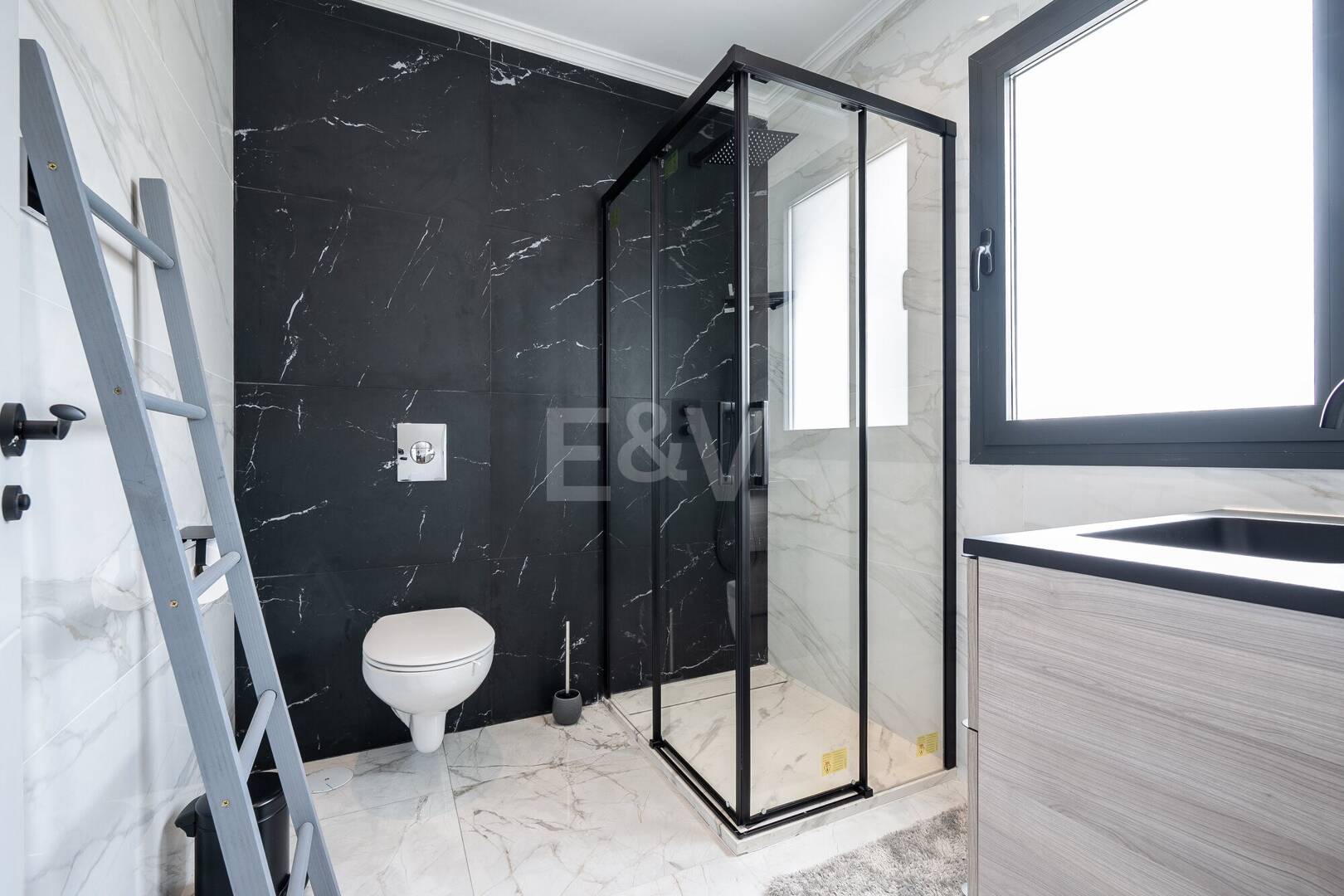 Contemporary Beachfront Villa in Marbella East: Perfect Family Getaway Steps from Elviria 's Best Beach