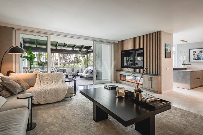 Impeccable Southwest-Facing Garden Apartment in Marina Puente Romano