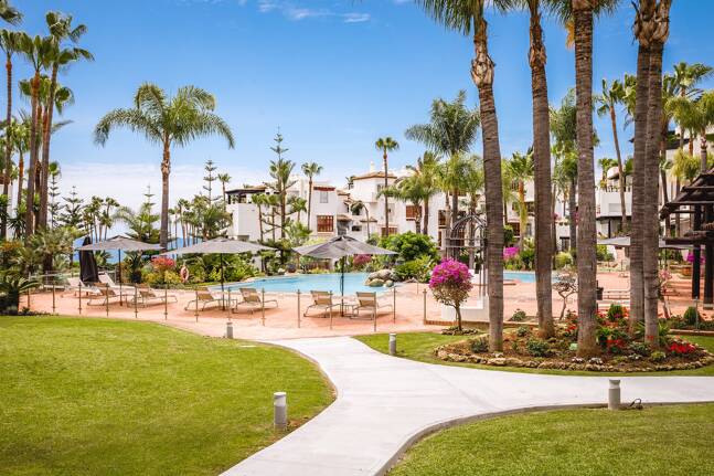 Impeccable Southwest-Facing Garden Apartment in Marina Puente Romano