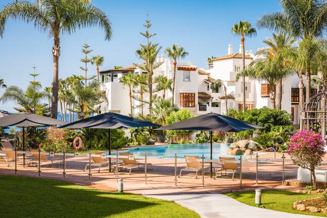 Impeccable Southwest-Facing Garden Apartment in Marina Puente Romano