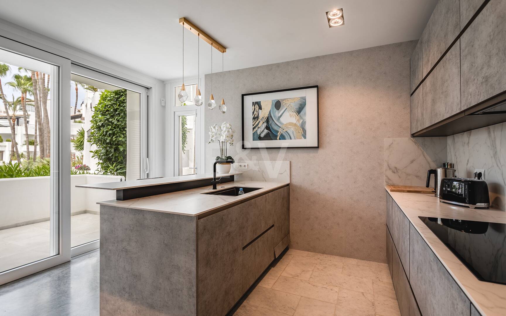 Impeccable Southwest-Facing Garden Apartment in Marina Puente Romano