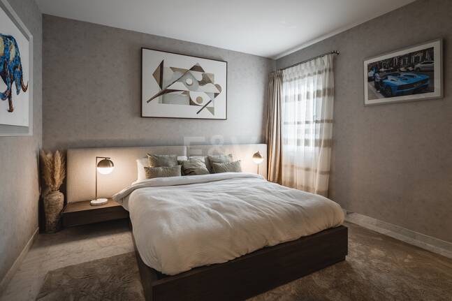 Impeccable Southwest-Facing Garden Apartment in Marina Puente Romano