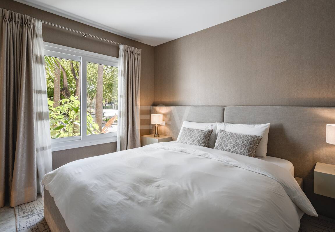 Impeccable Southwest-Facing Garden Apartment in Marina Puente Romano