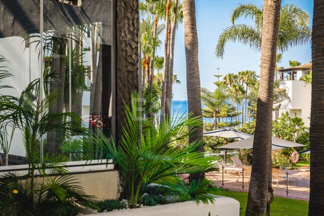 Impeccable Southwest-Facing Garden Apartment in Marina Puente Romano