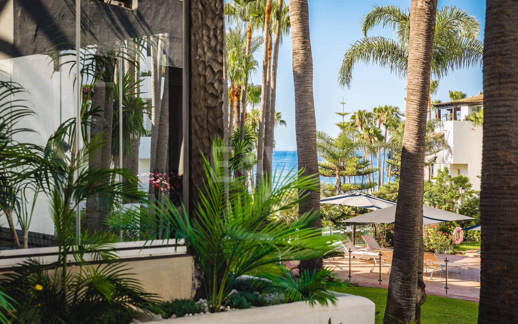 Impeccable Southwest- Facing Garden Apartment w Marina Puente Romano