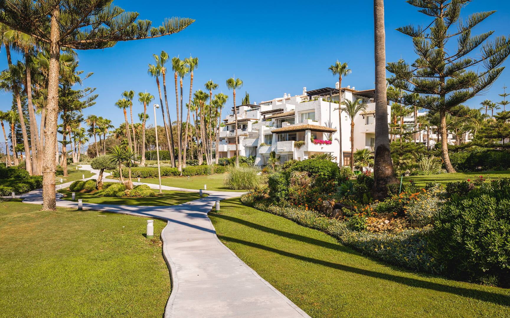 Impeccable Southwest-Facing Garden Apartment in Marina Puente Romano