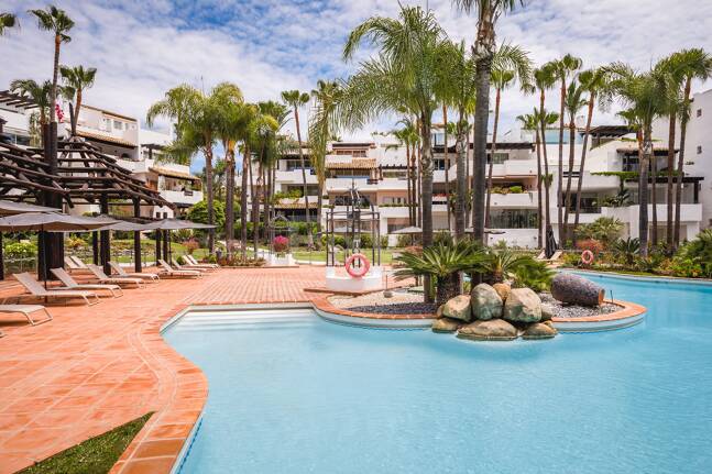 Impeccable Southwest-Facing Garden Apartment in Marina Puente Romano