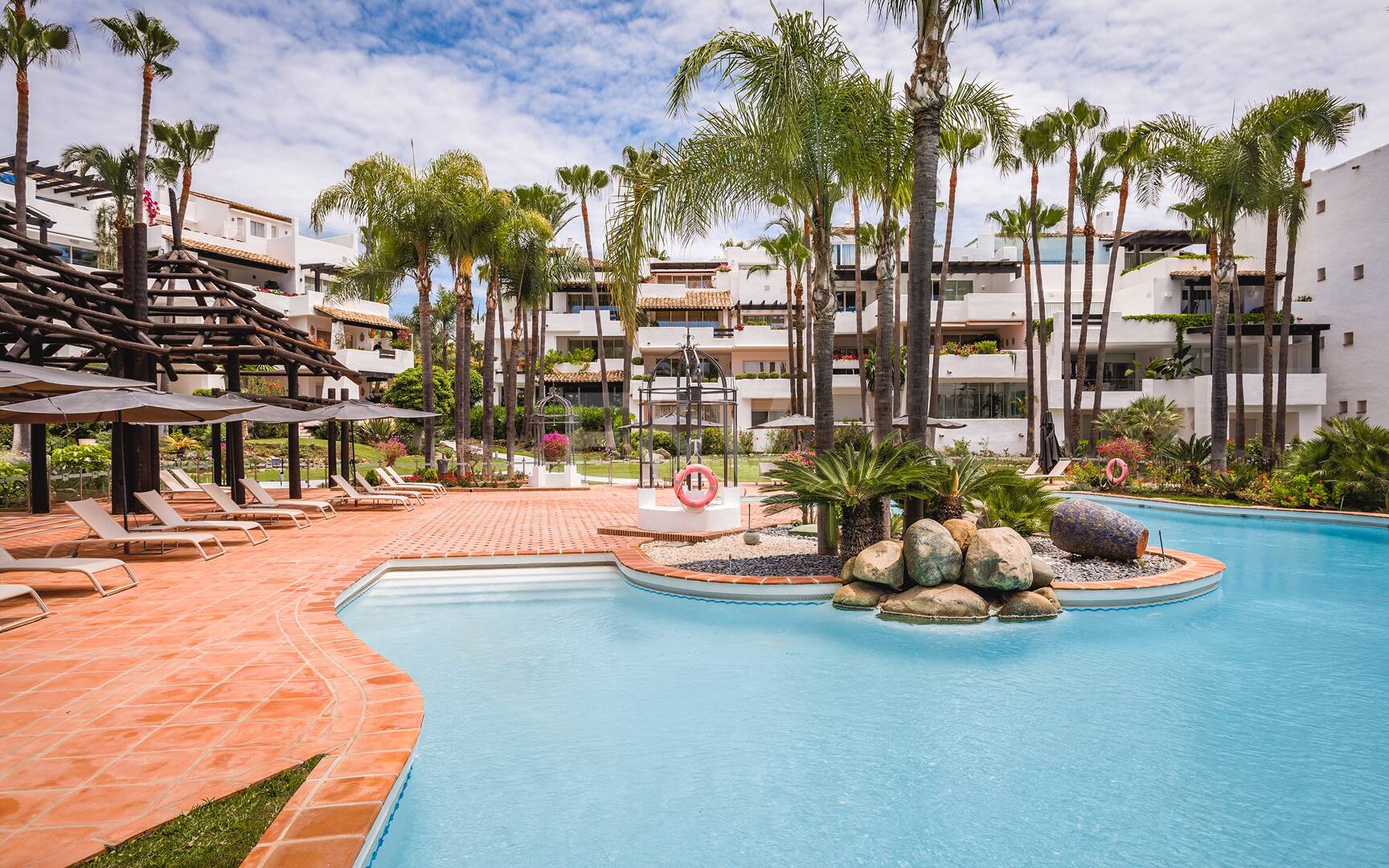 Impeccable Southwest-Facing Garden Apartment in Marina Puente Romano