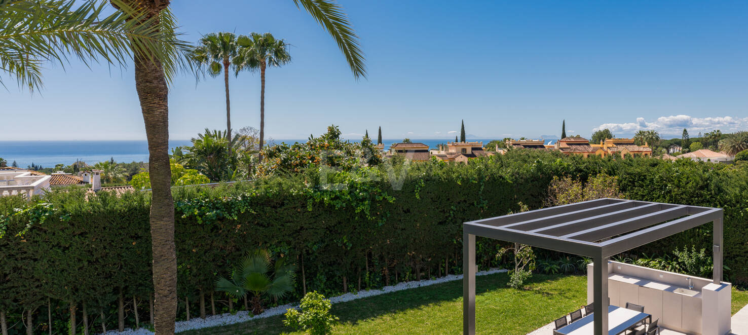 Stylowa willa w Nagüeles z widokiem na morze i góry