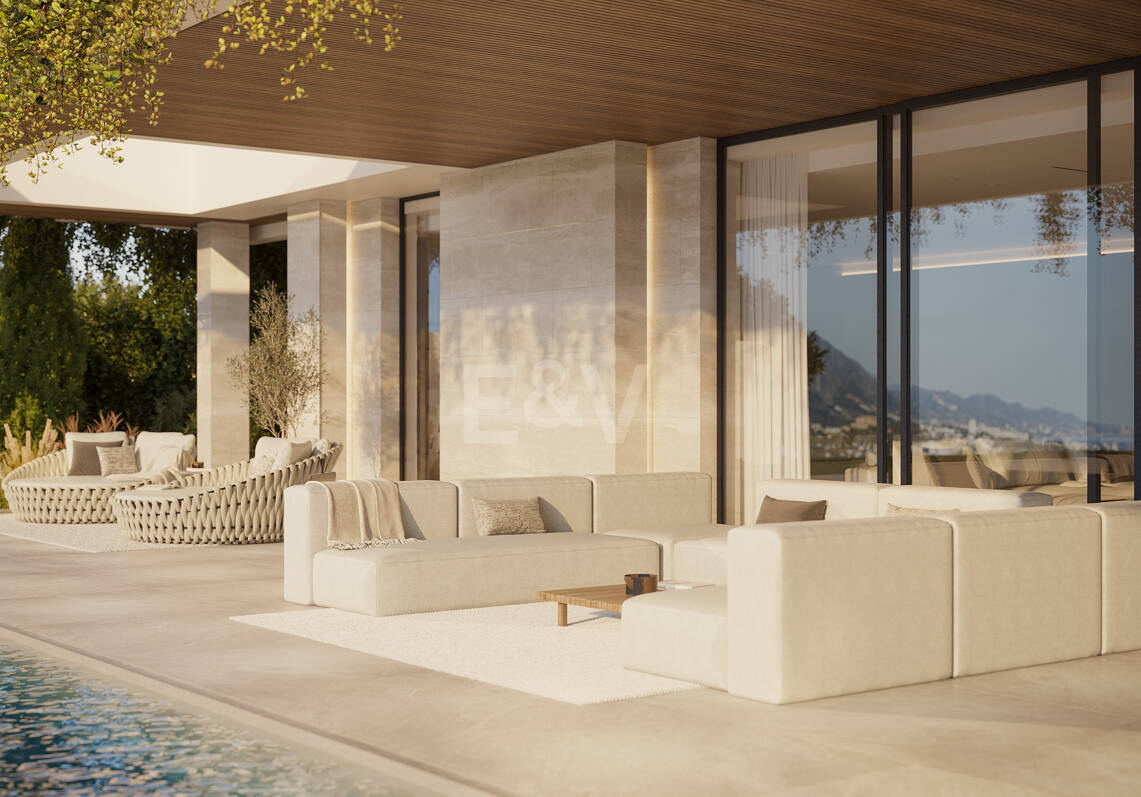 Villa de lujo moderno con vistas panorámicas al mar en una comunidad cerrada