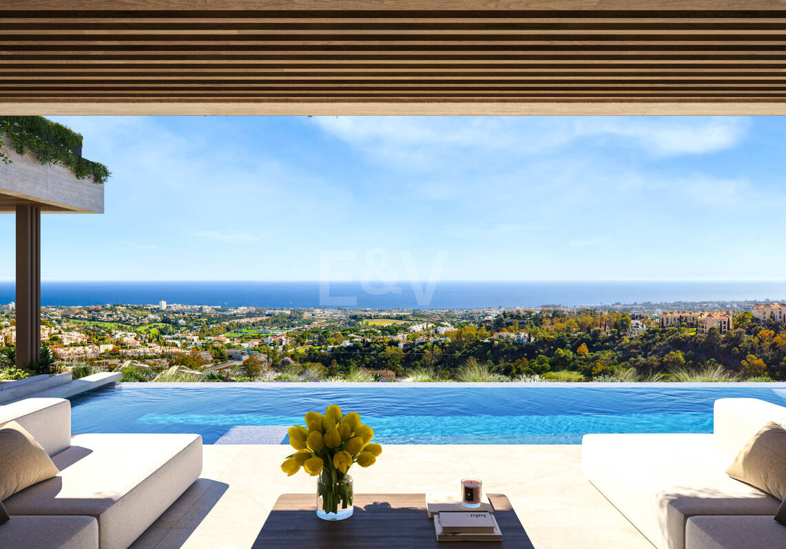 Villa de lujo moderno con vistas panorámicas al mar en una comunidad cerrada