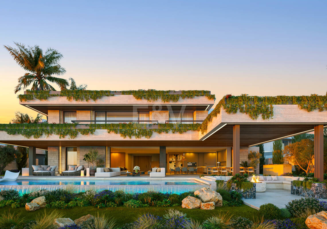 Villa de lujo moderno con vistas panorámicas al mar en una comunidad cerrada