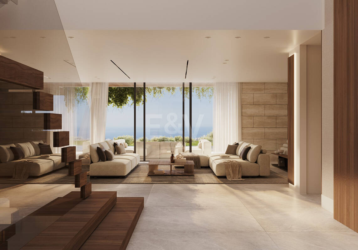 Villa de lujo moderno con vistas panorámicas al mar en una comunidad cerrada