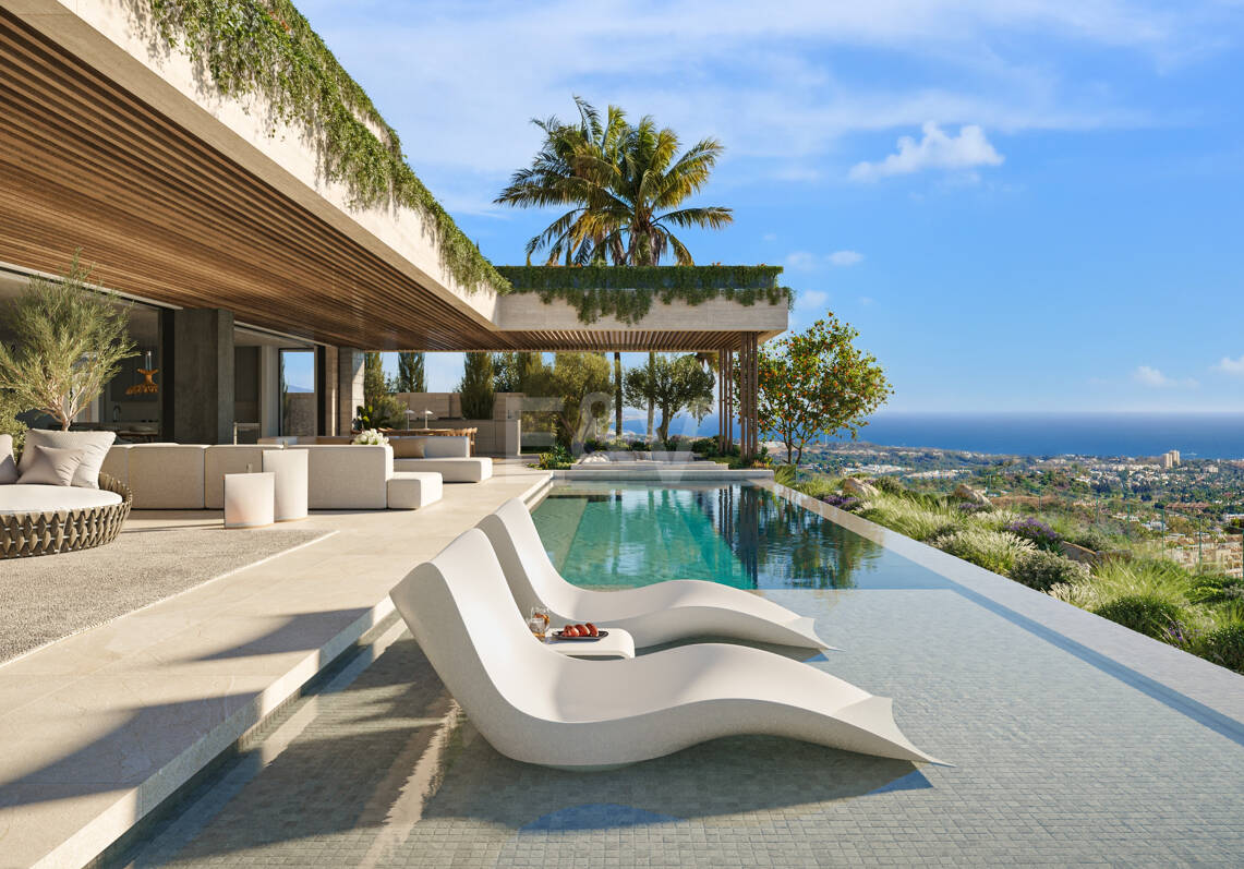 Villa de lujo moderno con vistas panorámicas al mar en una comunidad cerrada