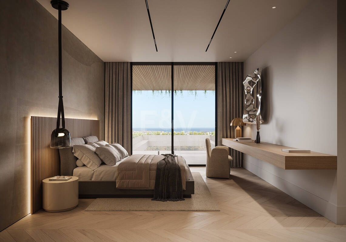 Villa de lujo moderno con vistas panorámicas al mar en una comunidad cerrada