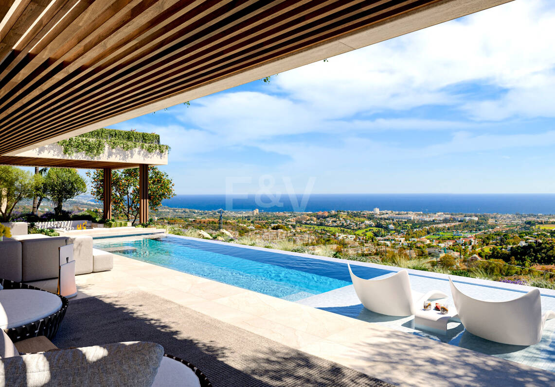 Villa de lujo moderno con vistas panorámicas al mar en una comunidad cerrada