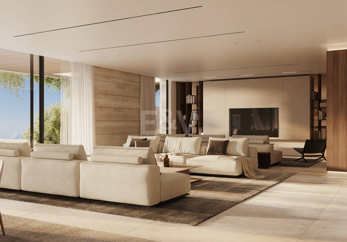Villa de lujo moderno con vistas panorámicas al mar en una comunidad cerrada