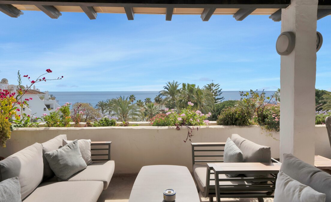 Ático en primera línea de playa con vistas panorámicas al mar en Coral Beach