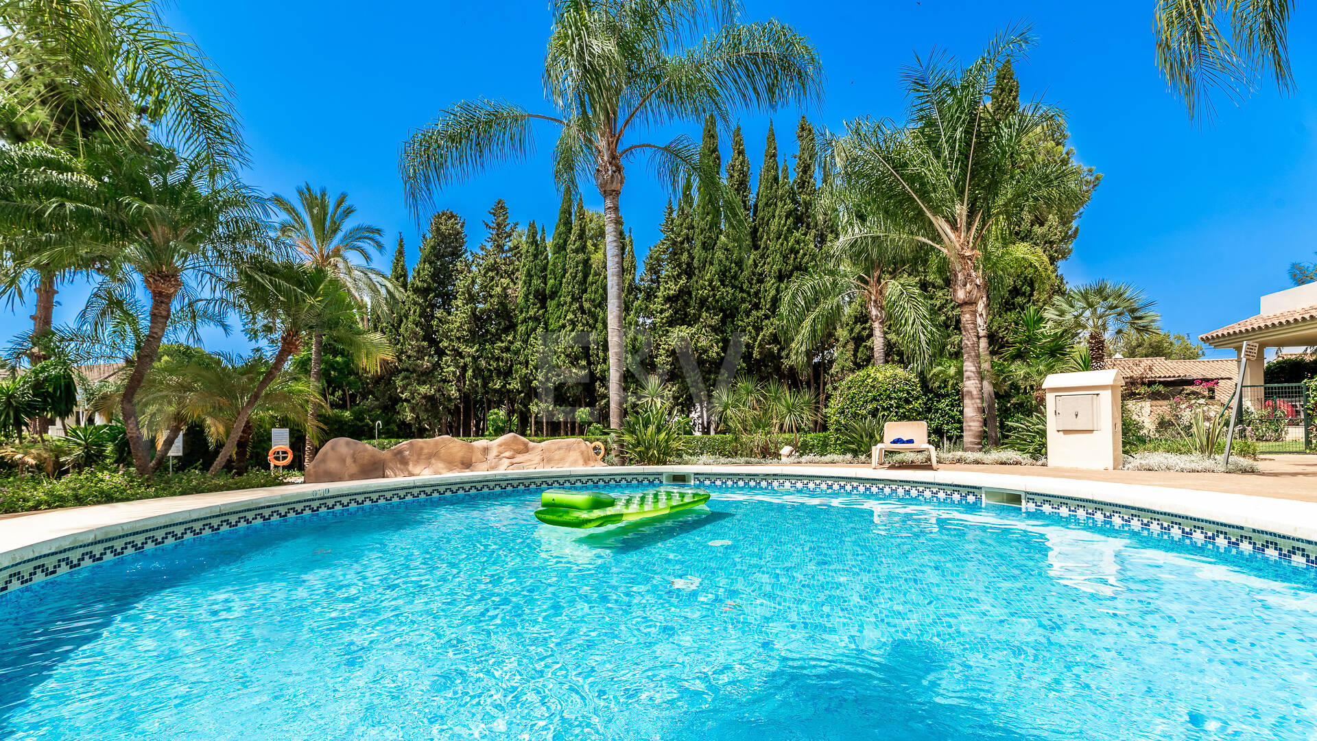 Charming Garden Apartment with Direct Pool Access in Gated Community