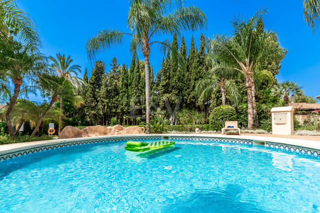 Charming Garden Apartment with Direct Pool Access in Gated Community