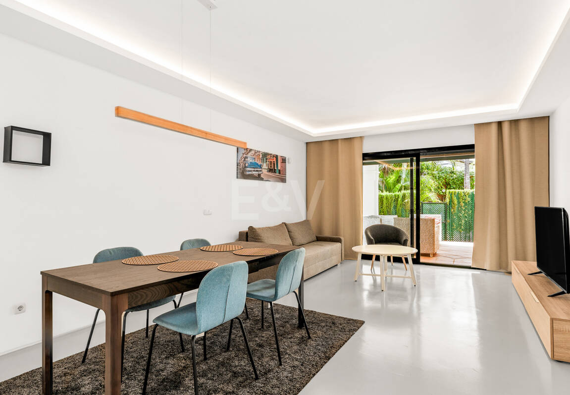 Charming Garden Apartment with Direct Pool Access in Gated Community