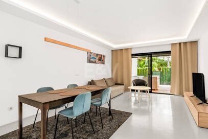 Charming Garden Apartment with Direct Pool Access in Gated Community