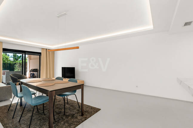 Charming Garden Apartment with Direct Pool Access in Gated Community