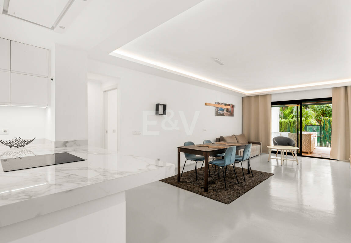 Charming Garden Apartment with Direct Pool Access in Gated Community