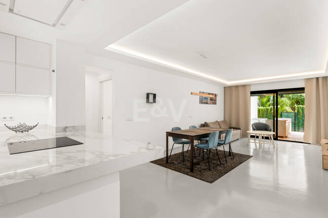 Charming Garden Apartment with Direct Pool Access in Gated Community