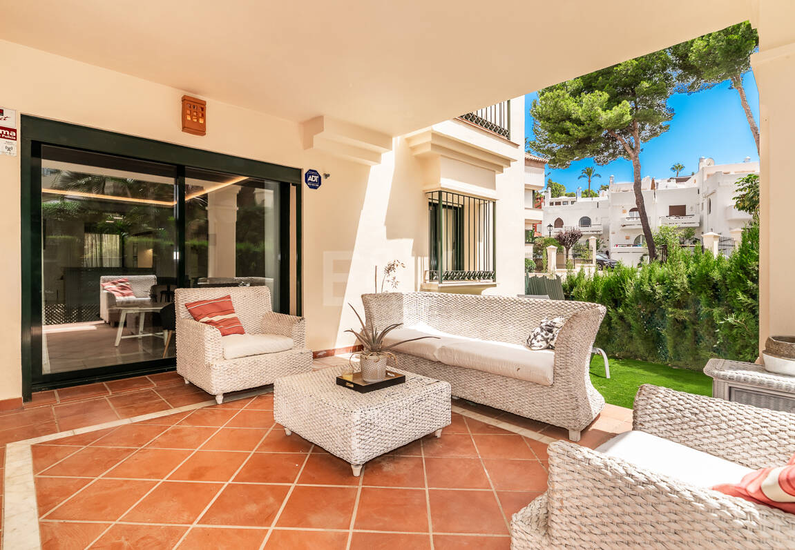 Charming Garden Apartment with Direct Pool Access in Gated Community