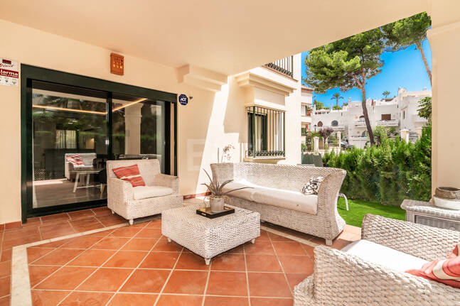 Charming Garden Apartment with Direct Pool Access in Gated Community