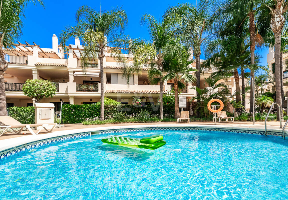 Charming Garden Apartment with Direct Pool Access in Gated Community