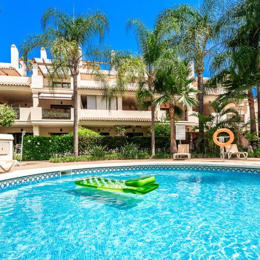 Charming Garden Apartment with Direct Pool Access in Gated Community