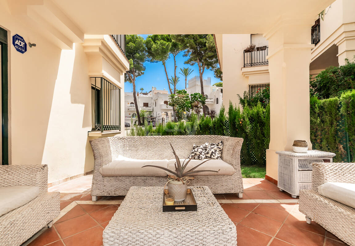 Charming Garden Apartment with Direct Pool Access in Gated Community