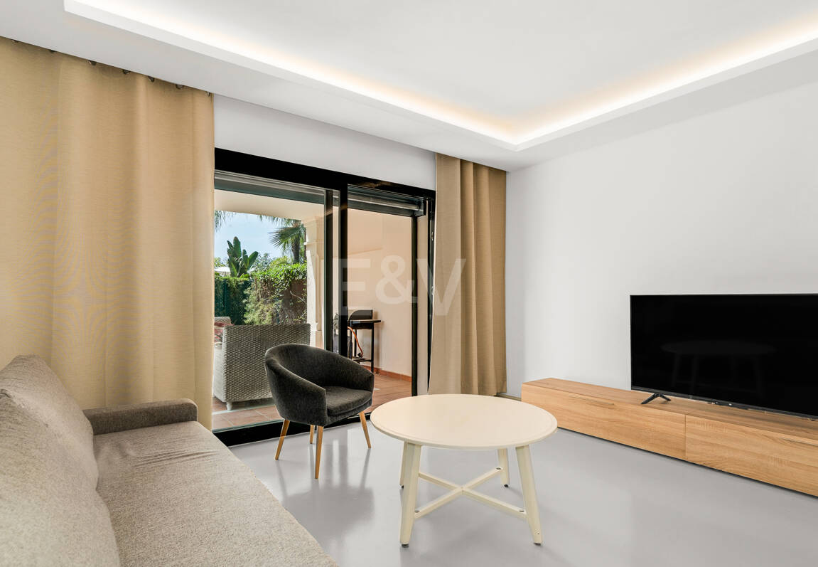 Charming Garden Apartment with Direct Pool Access in Gated Community