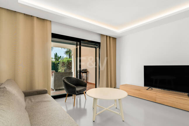 Charming Garden Apartment with Direct Pool Access in Gated Community