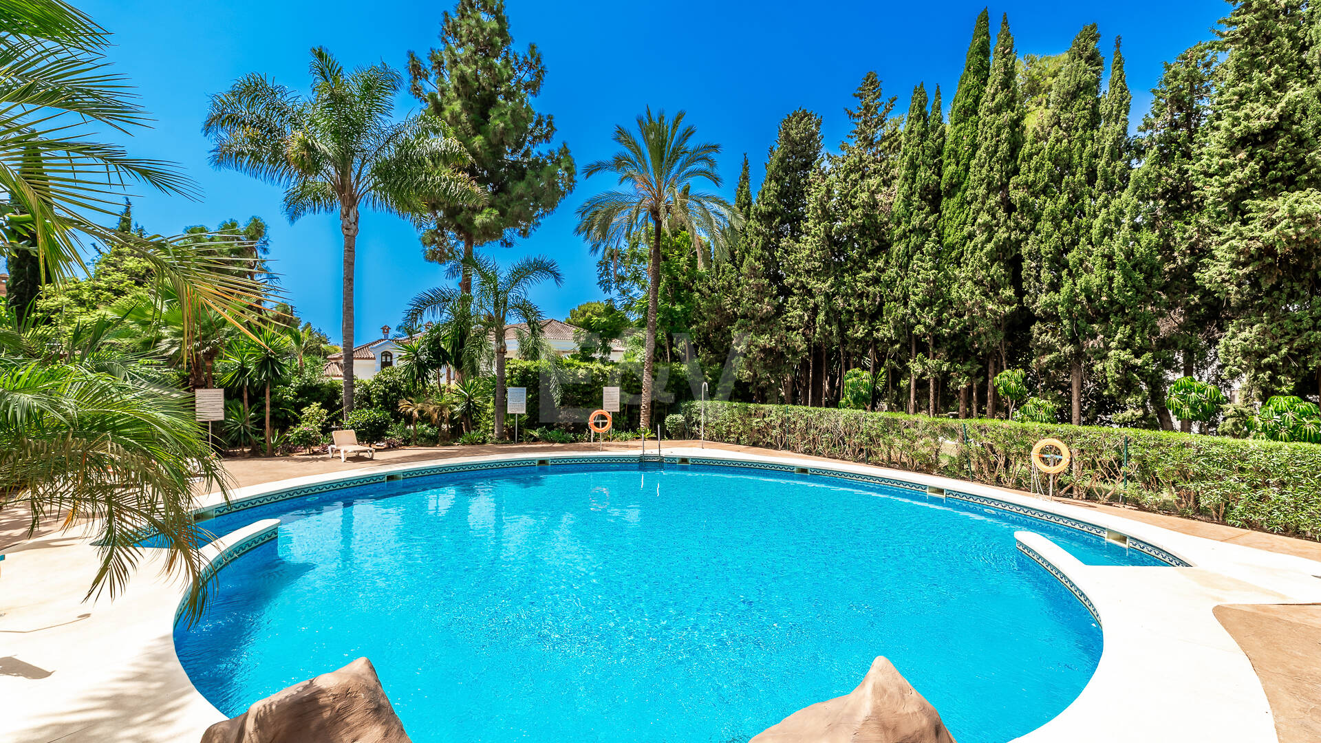 Charming Garden Apartment with Direct Pool Access in Gated Community