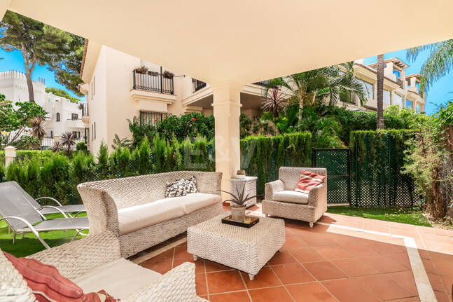 Charming Garden Apartment with Direct Pool Access in Gated Community