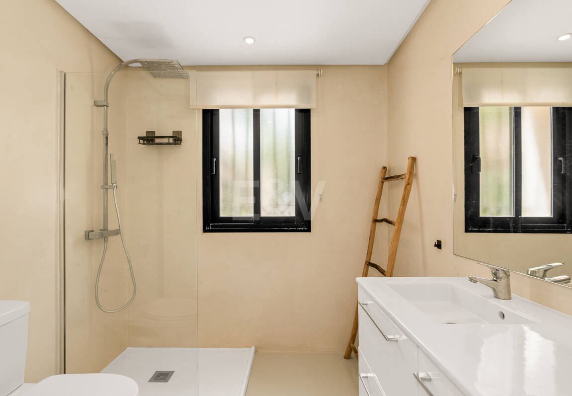 Charming Garden Apartment with Direct Pool Access in Gated Community