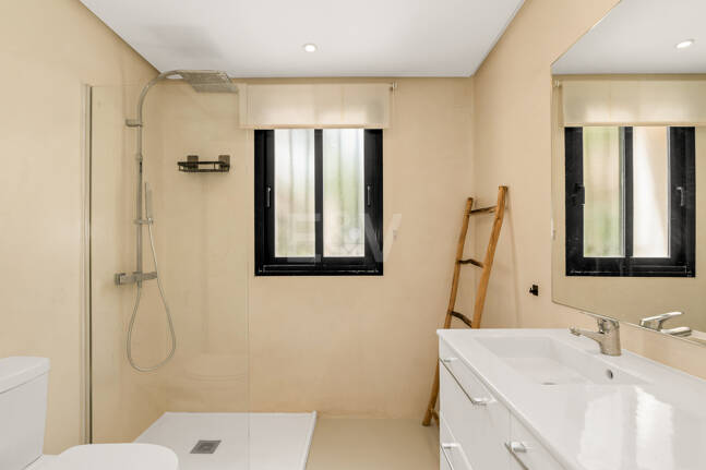 Charming Garden Apartment with Direct Pool Access in Gated Community