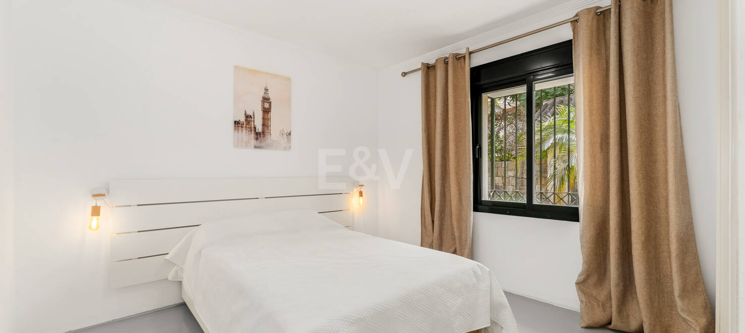 Charming Garden Apartment with Direct Pool Access in Gated Community
