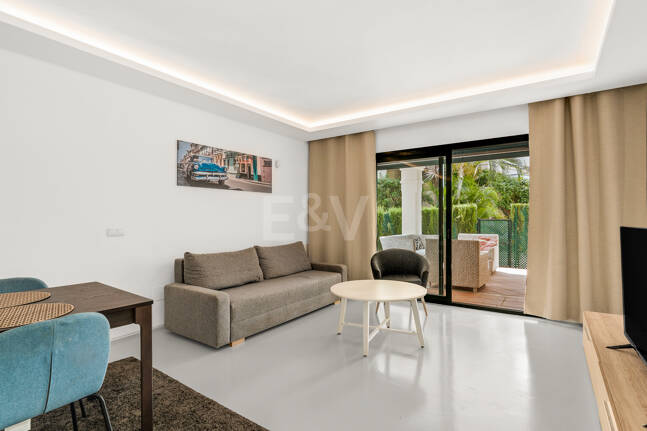 Charming Garden Apartment with Direct Pool Access in Gated Community