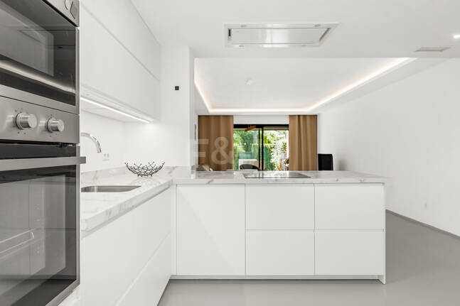 Charming Garden Apartment with Direct Pool Access in Gated Community