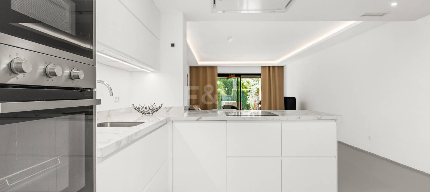 Charming Garden Apartment with Direct Pool Access in Gated Community